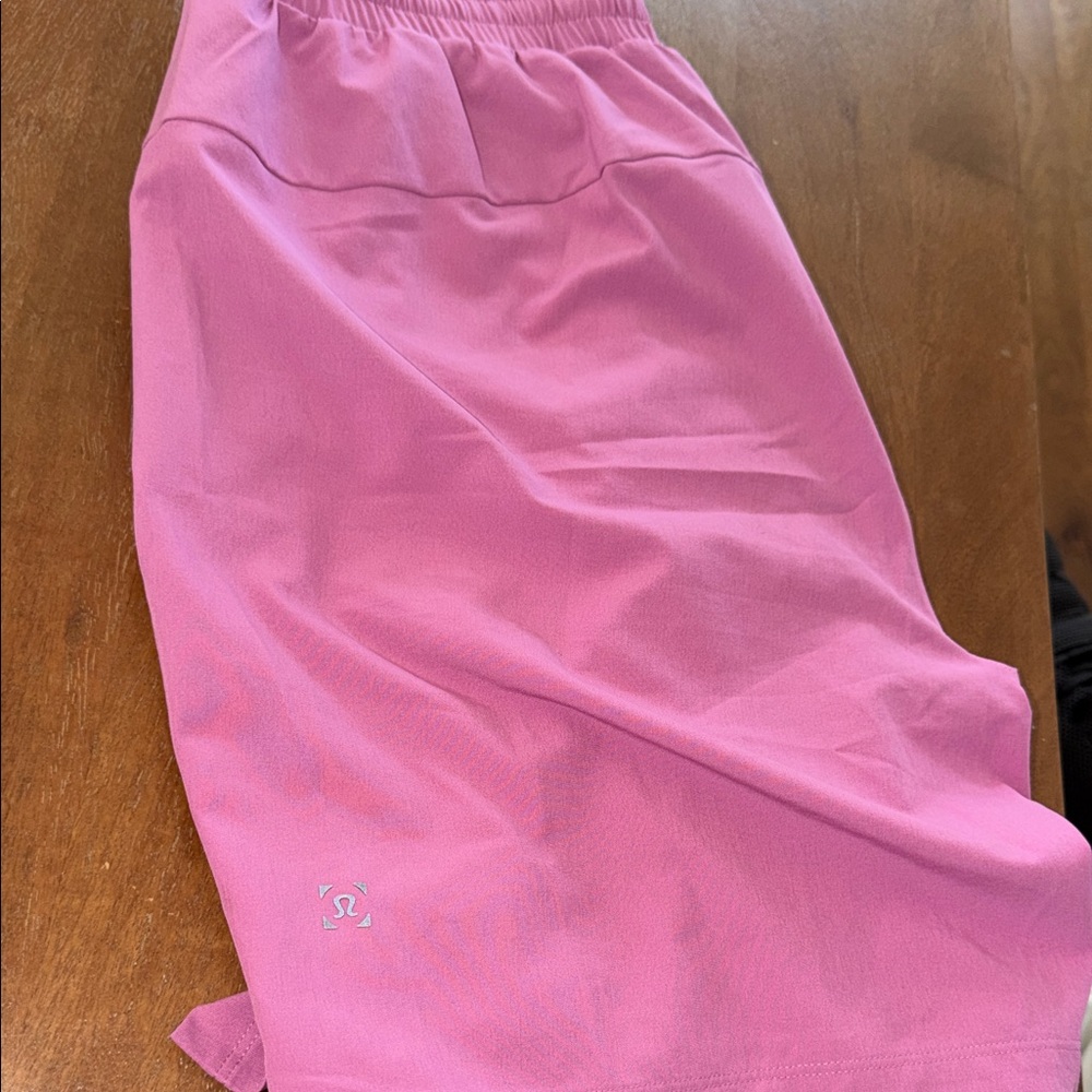 Men’s Lululemon Bathing suit PINK Size Medium. Never worn.